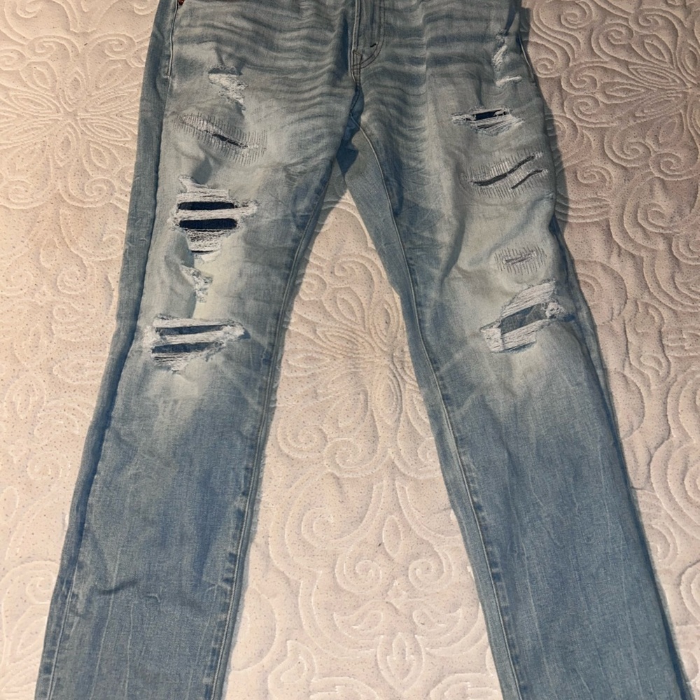 American Eagle Outfitters Light Blue Distressed Skinny Jeans